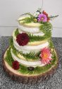 Rustykalny tort weselny z kwiatami