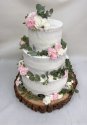 Rustykalny tort weselny z kwiatami